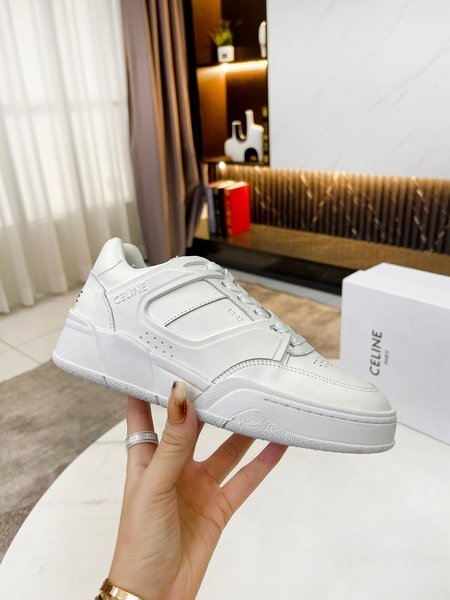 Celine Panda color couple sports white shoes