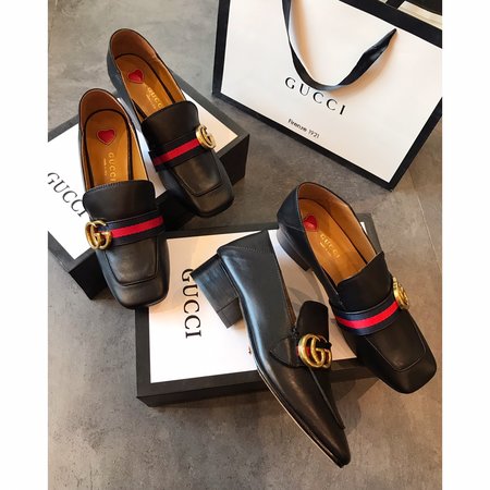 Gucci Calfskin slippers with GG buckle