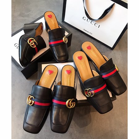 Gucci Calfskin slippers with GG buckle