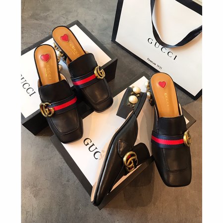 Gucci Calfskin slippers with GG buckle
