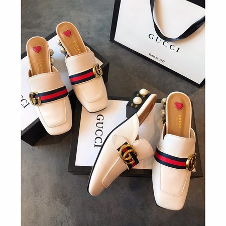 Gucci Calfskin slippers with GG buckle