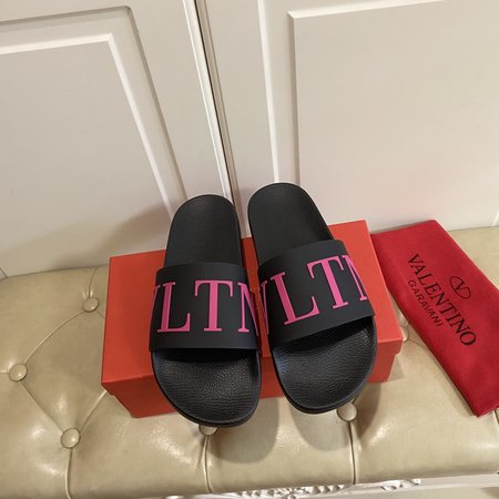 Valentino Slippers VLTN letters in sheepskin
