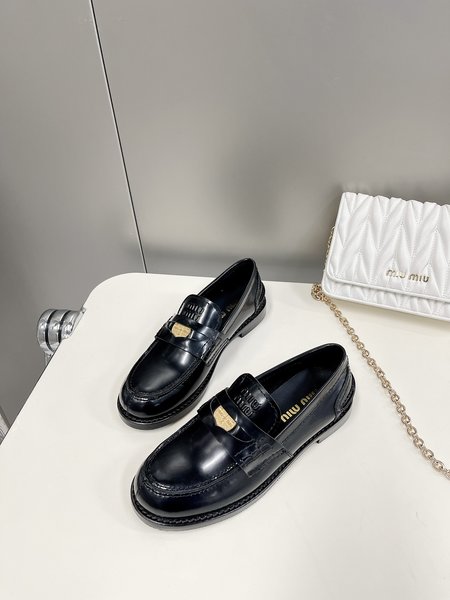 Miu Miu coin loafers