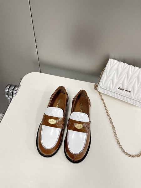 Miu Miu coin loafers
