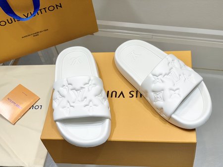 Louis Vuitton Embossed beach sandal slides
