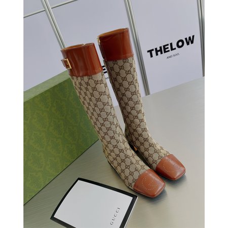 Gucci Mid block heel ankle boots.