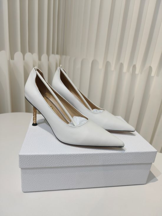 Christian Dior Pointed Toe Pumps With Unique Metallic Heel