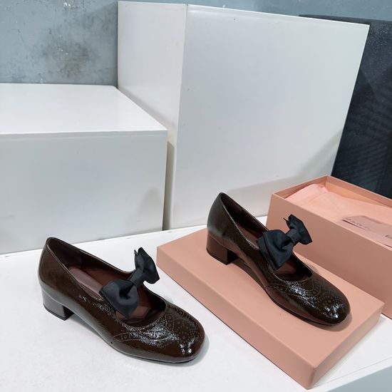 Miu Miu Patent Leather Mary Jane Shoes with Bow Detail
