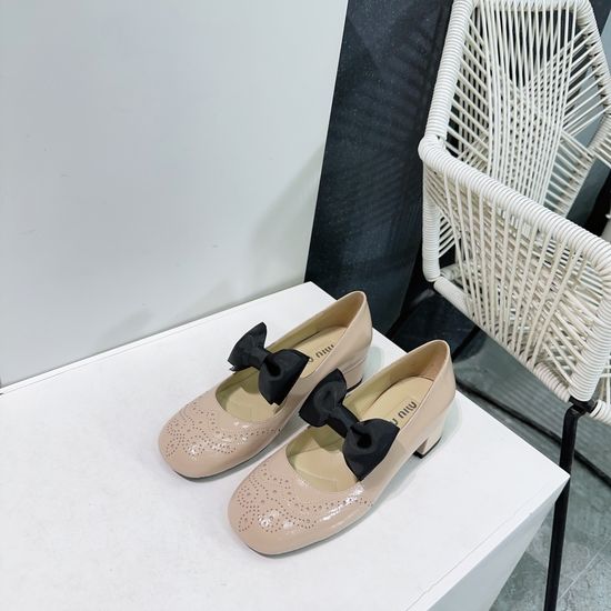 Miu Miu Patent Leather Mary Jane Shoes with Bow Detail