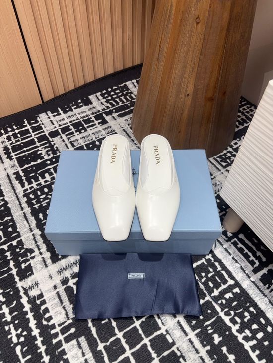 Prada Patent Leather Square Toe Mules with Logo Sole
