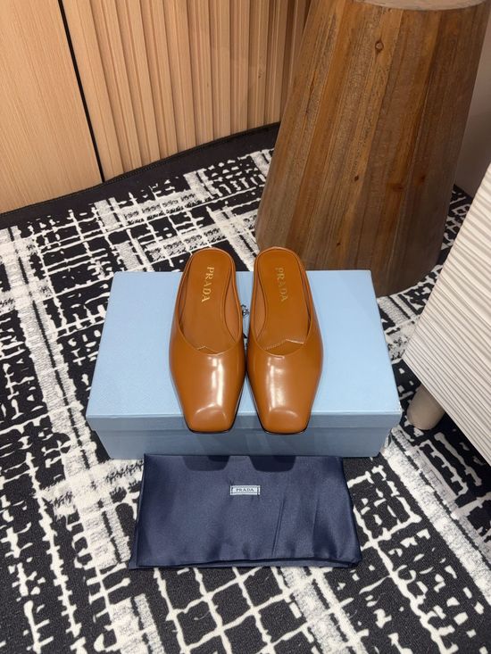 Prada Patent Leather Square Toe Mules with Logo Sole