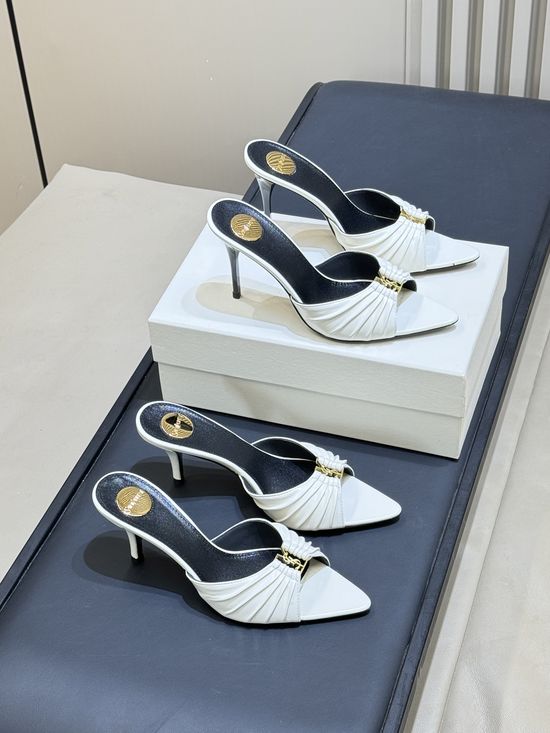 Yves Saint Laurent Elegant Pointed Toe Stiletto Mules With Logo Accent